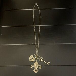 Bronze necklace with 3 large charms.